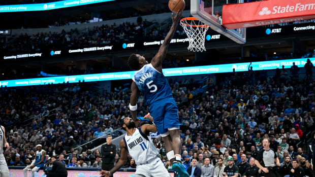 Anthony Edwards shoots a layup